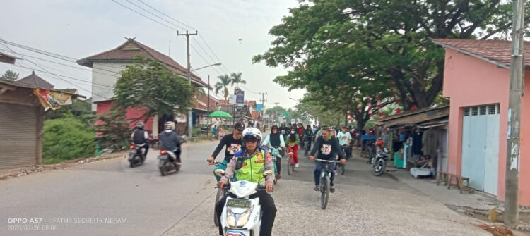 Polsek Pamanukan Kawal Gowes Dalam Acara HUT SMAN 1 Pamanukan